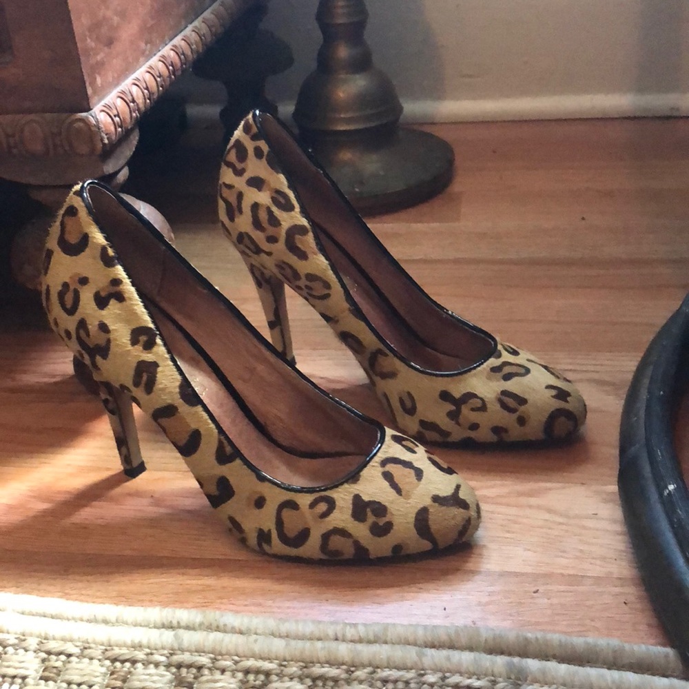 Aldo Leopard print high heel shoes.